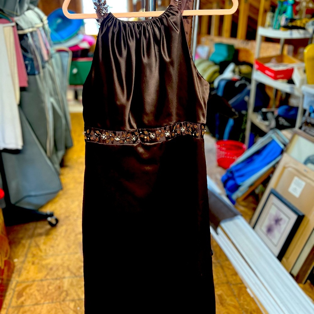 Brown satin formal with embellished straps and empire waste design.